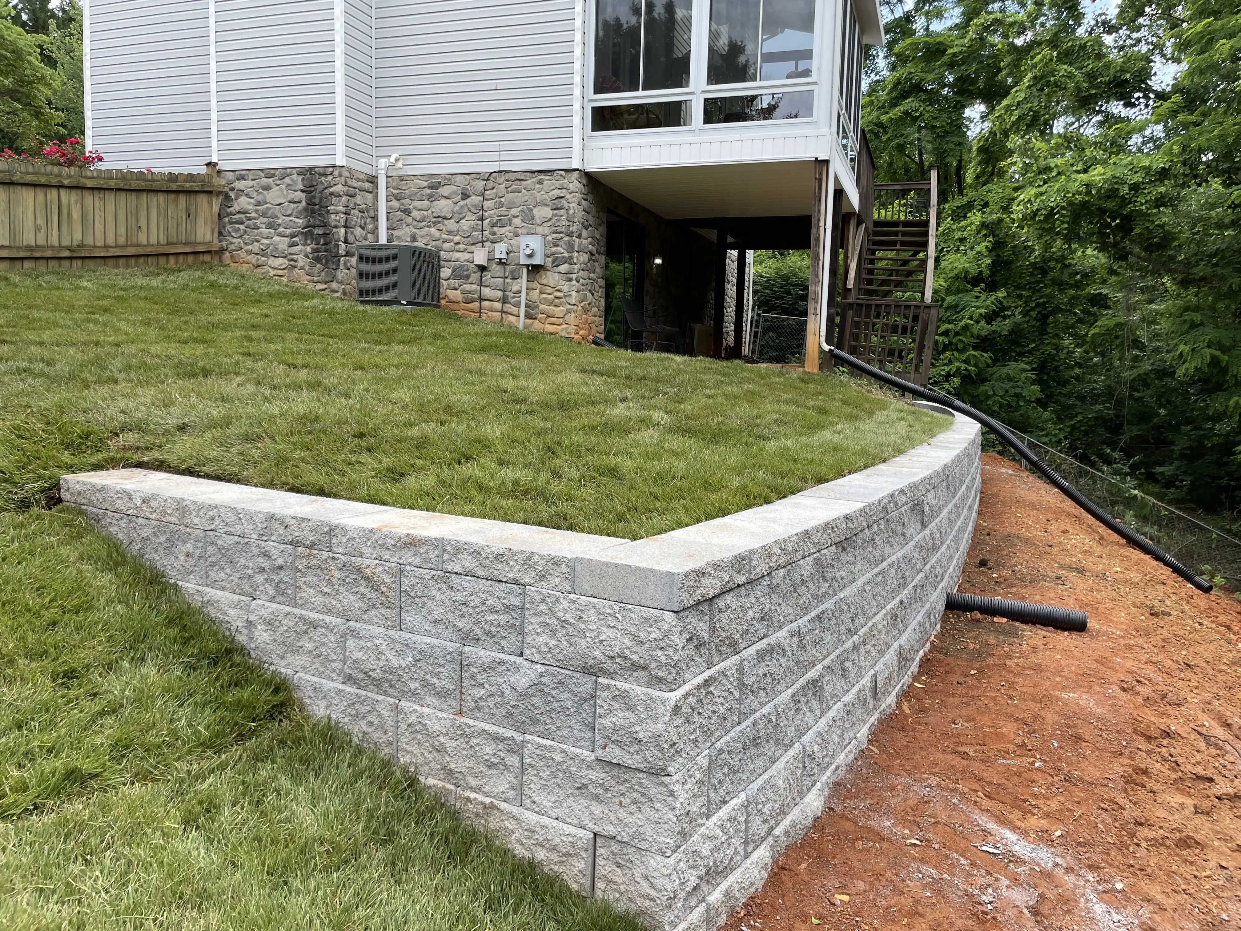 Retaining wall with sod restoration in Roanoke