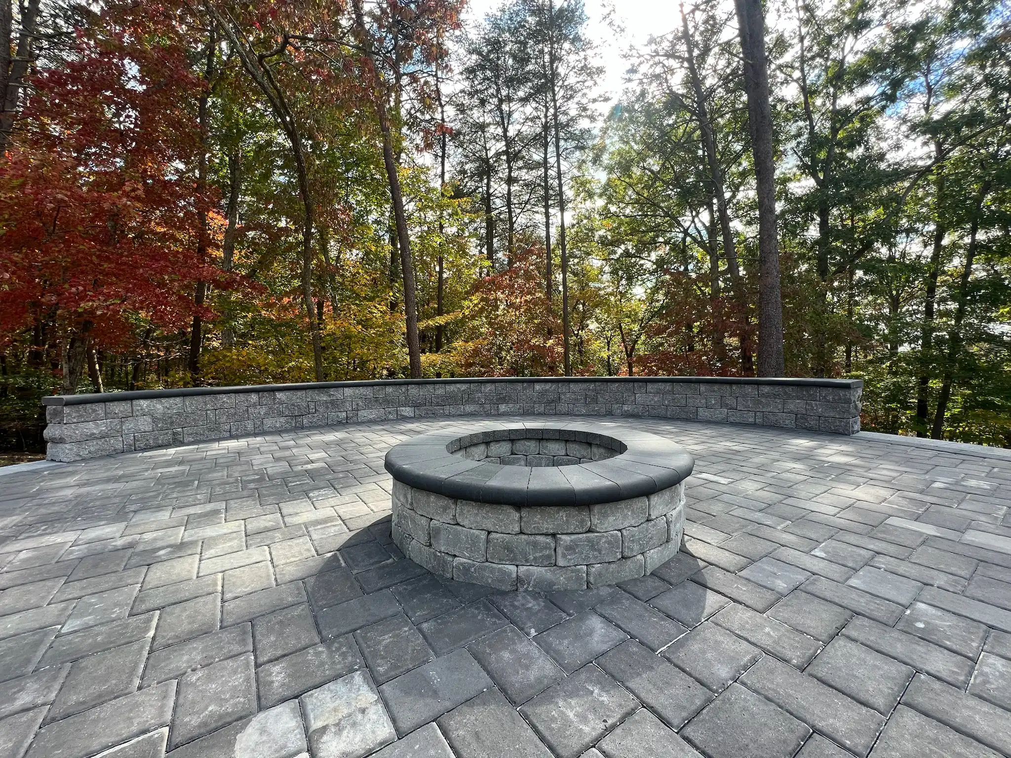 Circular paver patio with sitting wall