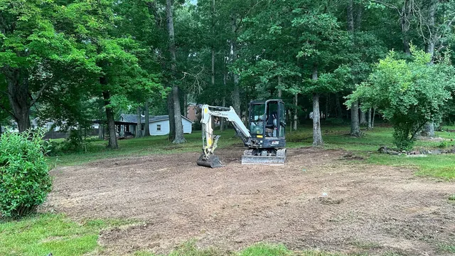 Mini excavator on residential site