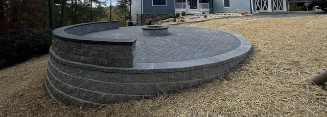 Circular paver patio with sitting wall